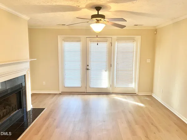 a view of a kitchen with appliances and a window