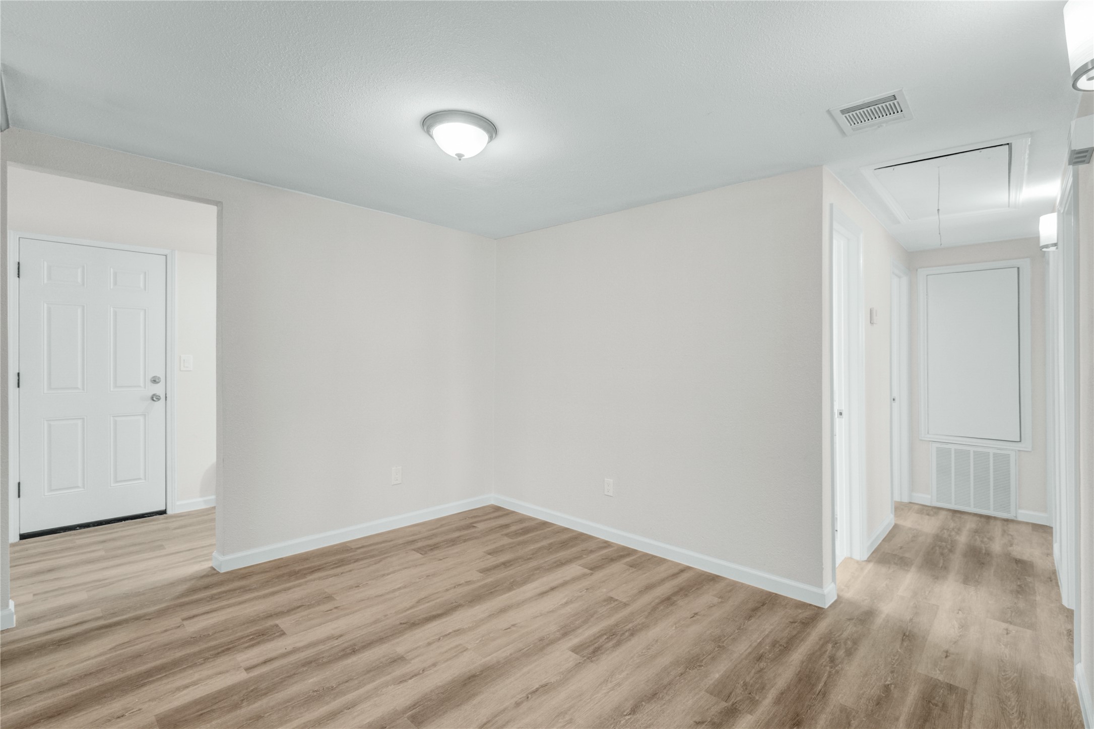 207 East Bernard Street Clute, TX 77531 - Photo 8 of 25 a view of a room with wooden floor