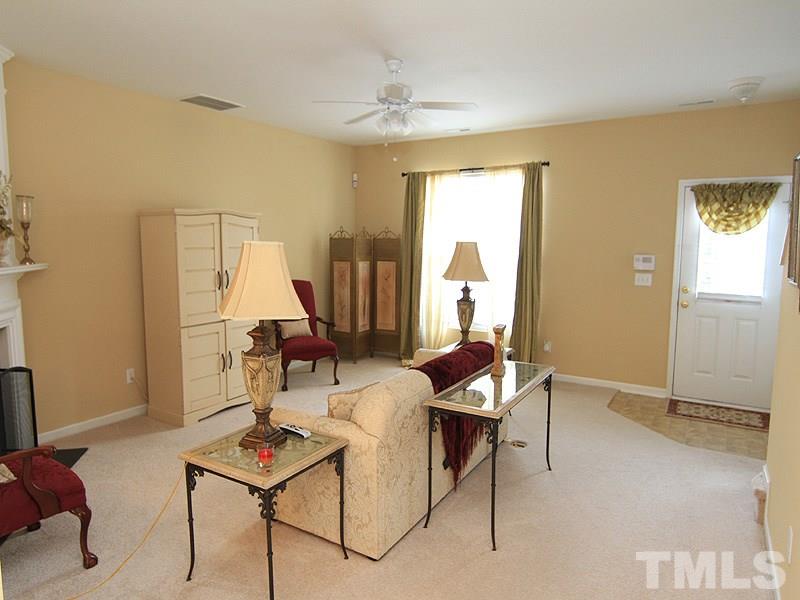 5349 Glen Canyon Road Raleigh, NC 27616 - Photo 3 of 14 a living room with furniture and a window