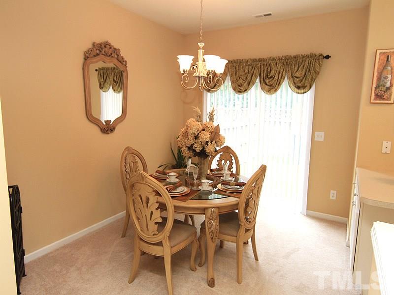 5349 Glen Canyon Road Raleigh, NC 27616 - Photo 5 of 14 a dining room with furniture and window
