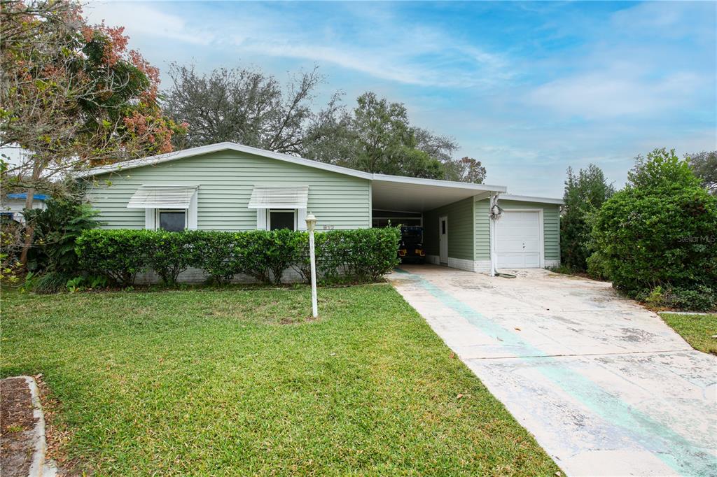 a view of outdoor space yard and front view of a house
