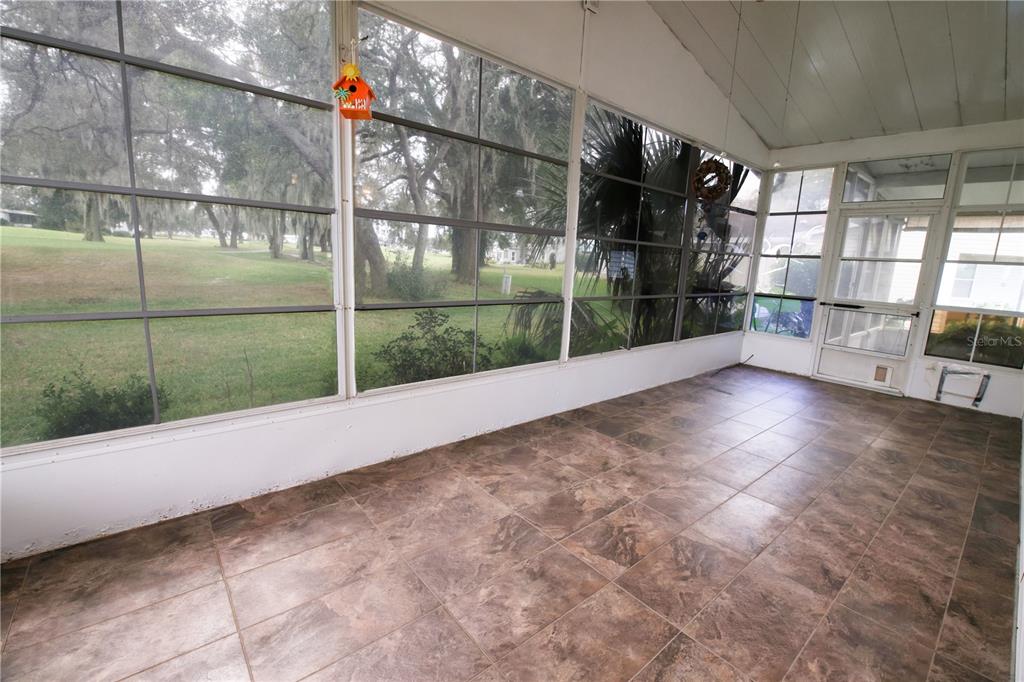 912 Orchid Street The Villages, FL 32159 - Photo 13 of 20 a view of outdoor space with wooden floor
