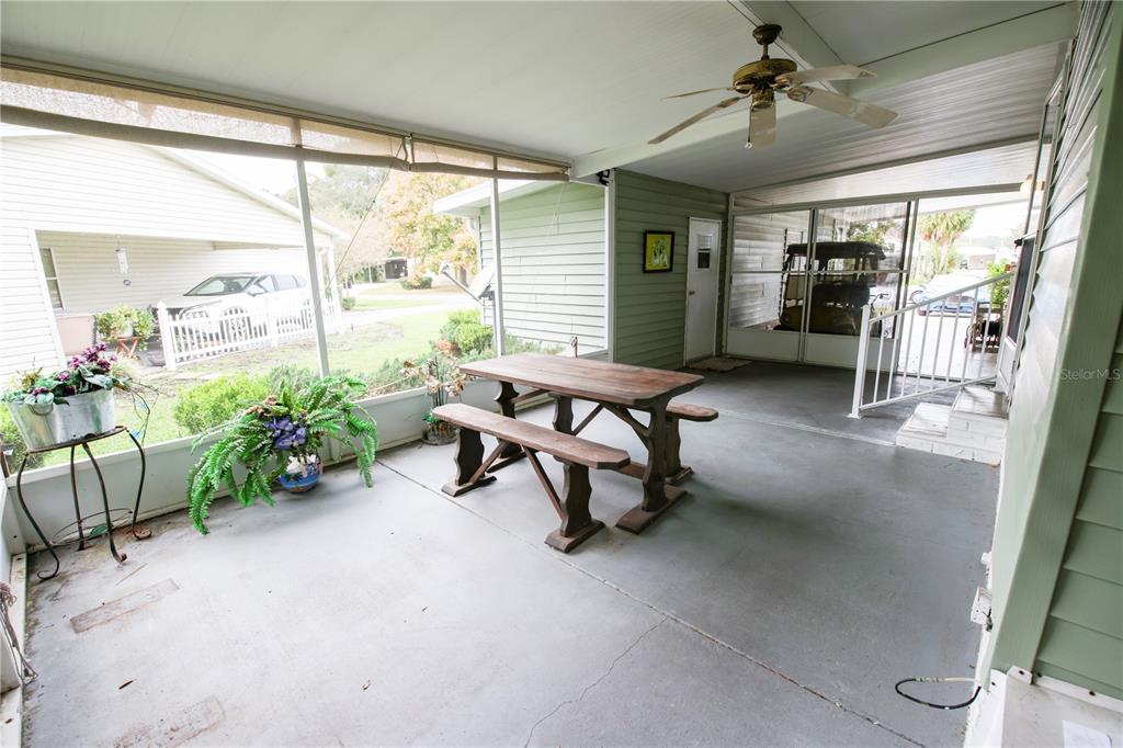 912 Orchid Street The Villages, FL 32159 - Photo 14 of 20 a view of a livingroom with furniture and a window
