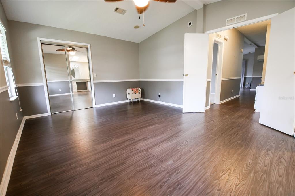 912 Orchid Street The Villages, FL 32159 - Photo 7 of 20 a view of livingroom with furniture and wooden floor