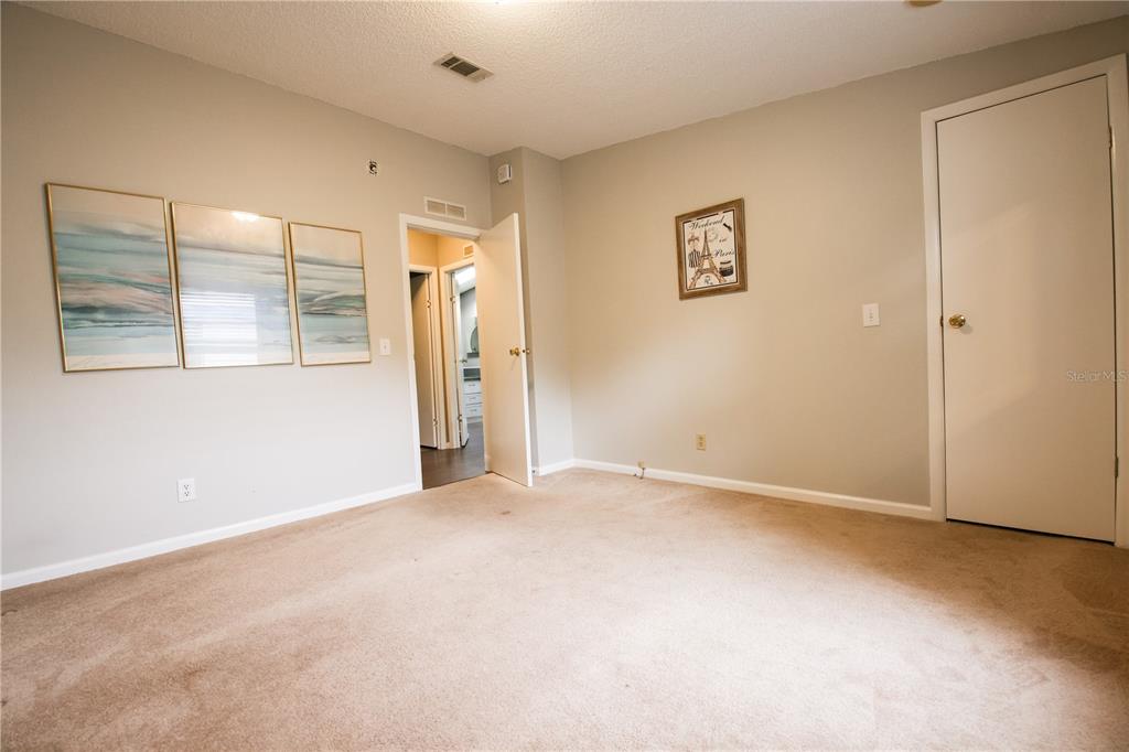 912 Orchid Street The Villages, FL 32159 - Photo 10 of 20 an empty room with windows