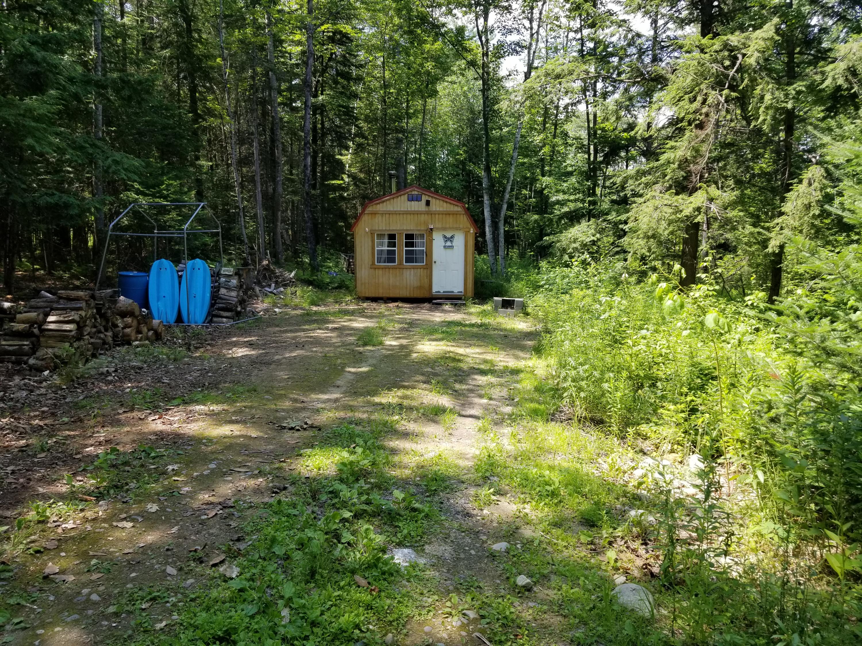 68 Packard Road Peru, ME 04290 - Photo 2 of 22 Cozy cabin tucked into the trees
