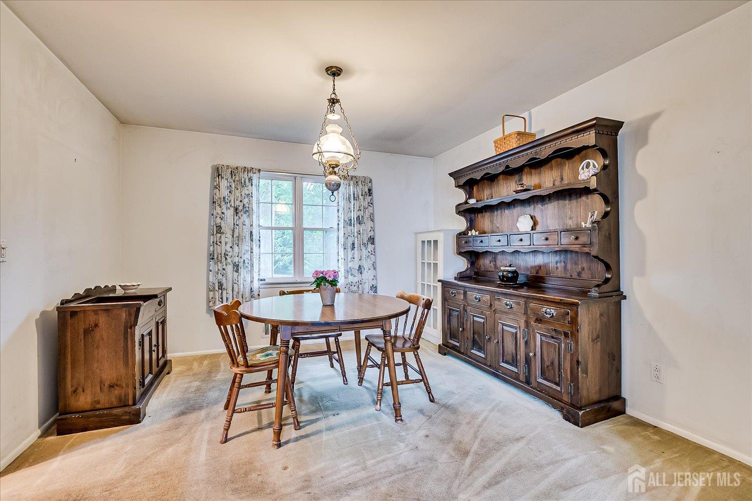 4 Bodnarik Road Edison, NJ 08837 - Photo 11 of 41 a view of a dining room with furniture