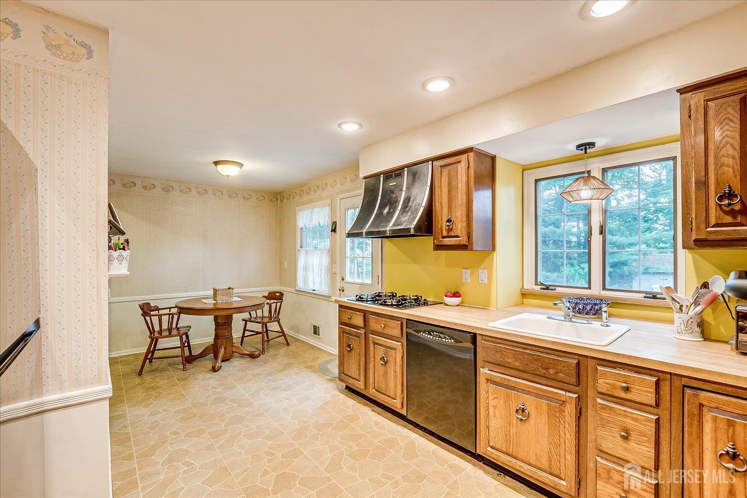 4 Bodnarik Road Edison, NJ 08837 - Photo 16 of 41 a large kitchen with a sink and cabinets
