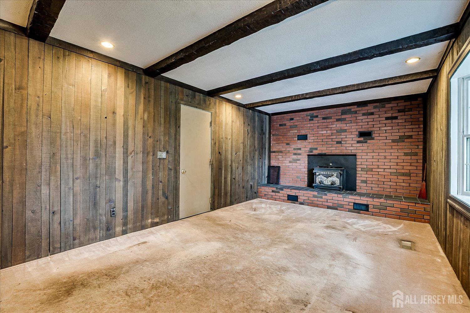 4 Bodnarik Road Edison, NJ 08837 - Photo 21 of 41 a view of an empty room with a fireplace
