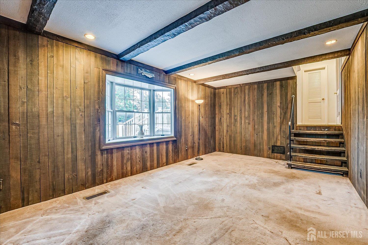 4 Bodnarik Road Edison, NJ 08837 - Photo 22 of 41 a view of a room with stairs and a front door