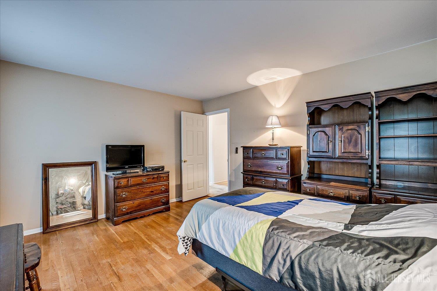 4 Bodnarik Road Edison, NJ 08837 - Photo 25 of 41 a bedroom with a bed and a television