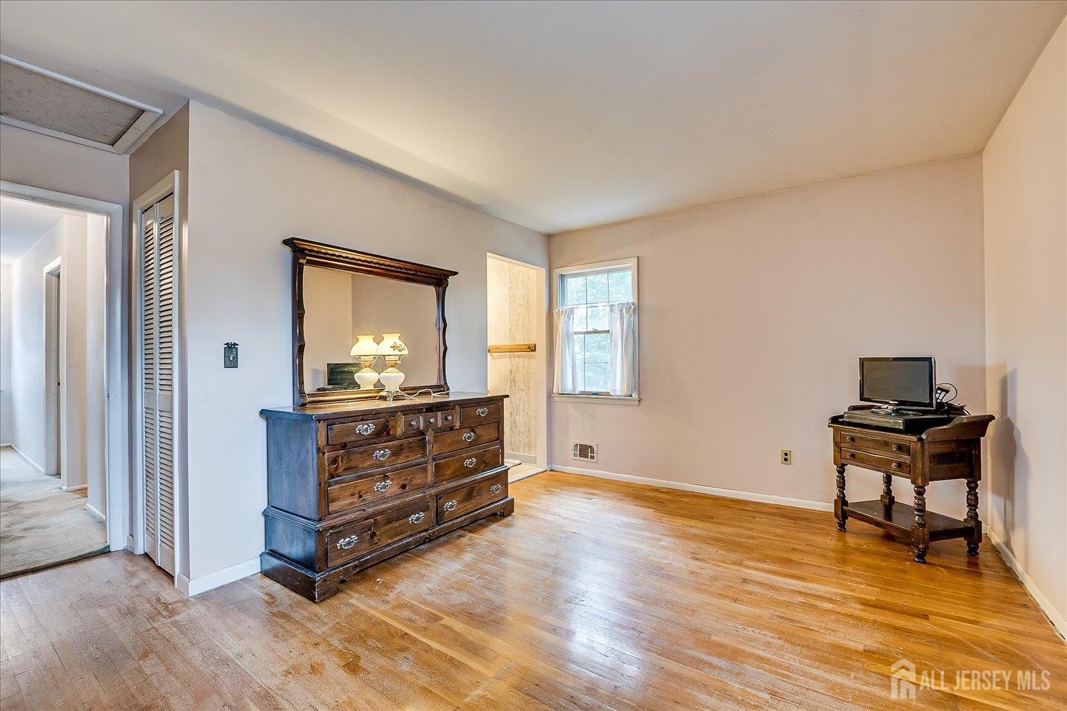 4 Bodnarik Road Edison, NJ 08837 - Photo 26 of 41 a room with furniture and a window
