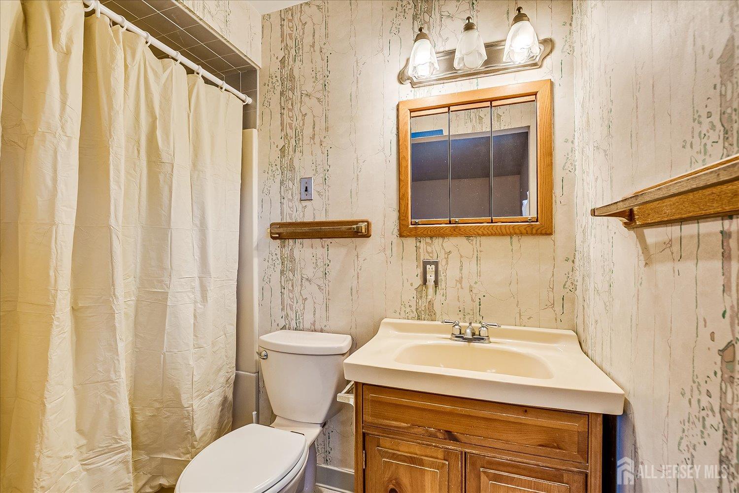 4 Bodnarik Road Edison, NJ 08837 - Photo 28 of 41 a bathroom with a sink toilet and shower