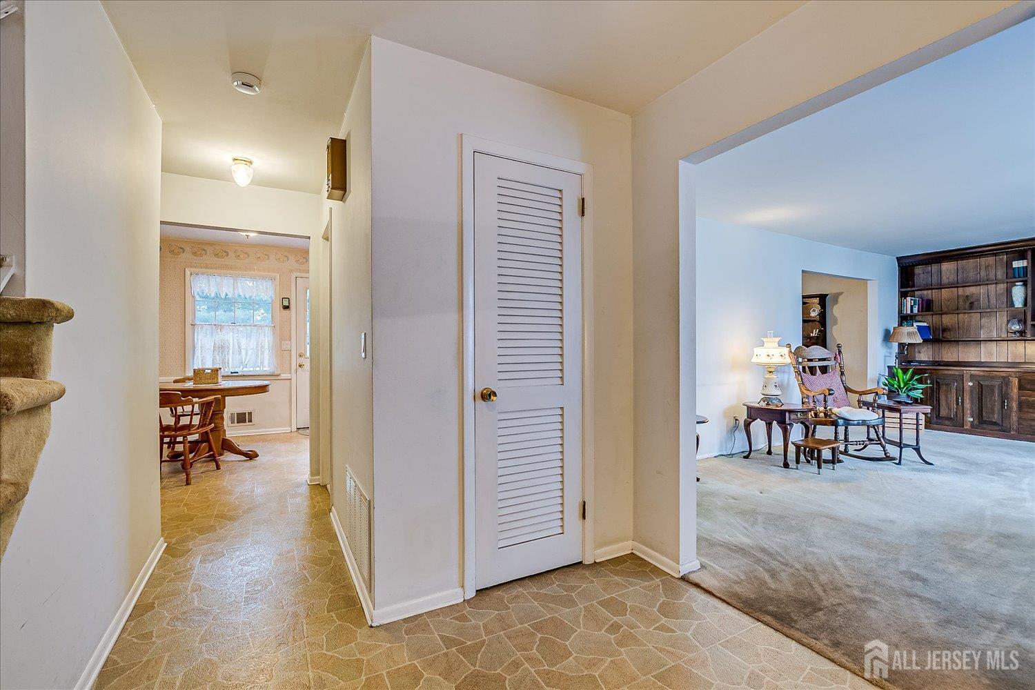 4 Bodnarik Road Edison, NJ 08837 - Photo 5 of 41 a view of a livingroom and a dining room with furniture