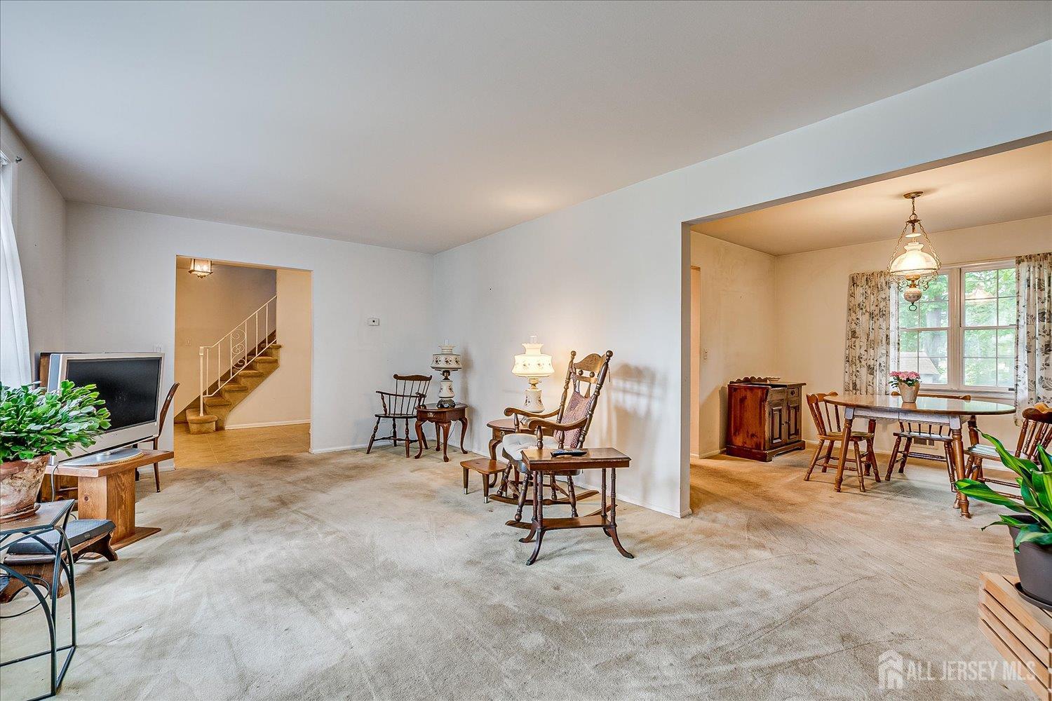 4 Bodnarik Road Edison, NJ 08837 - Photo 10 of 41 a living room with furniture and a large window