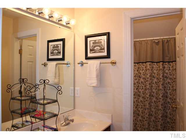 5101 Bartons Enclave Lane Raleigh, NC 27613 - Photo 19 of 25 a picture of a bathroom with a shower