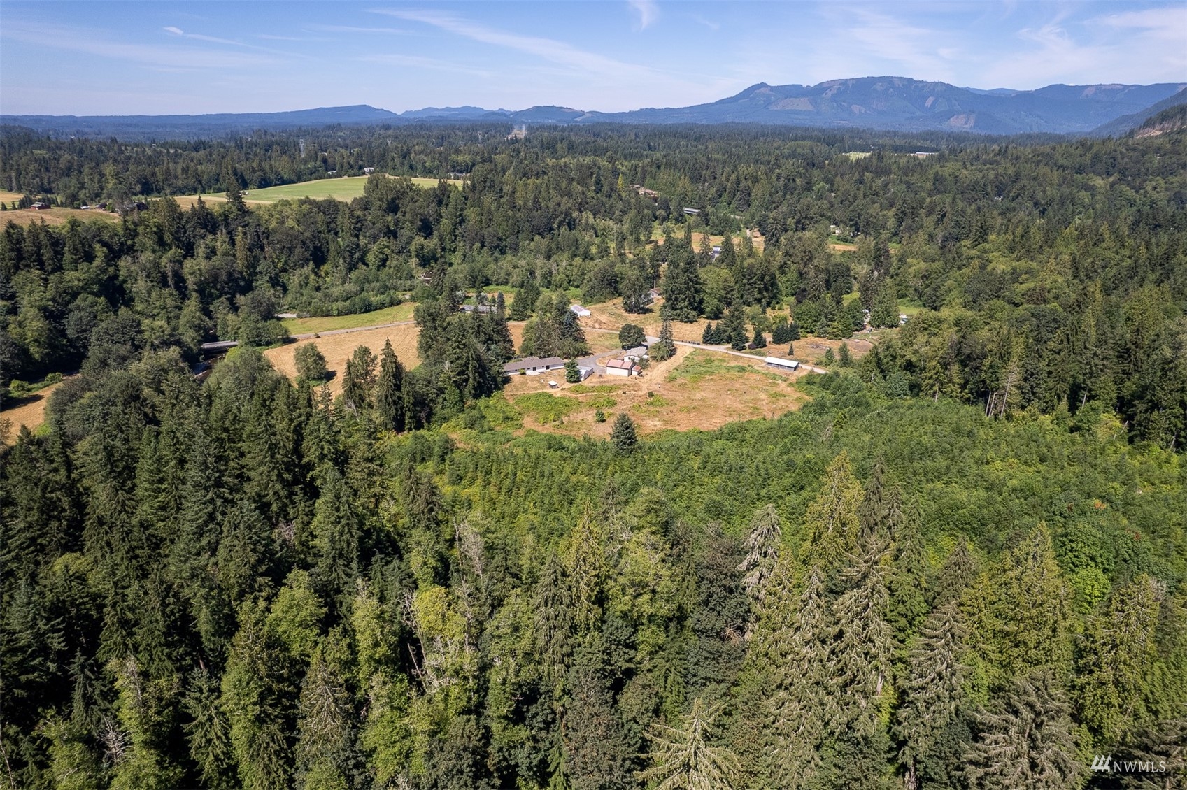 7-tract Whites Road Arlington, WA 98223 - Photo 1 of 15 a view of a lake with a mountain in the background