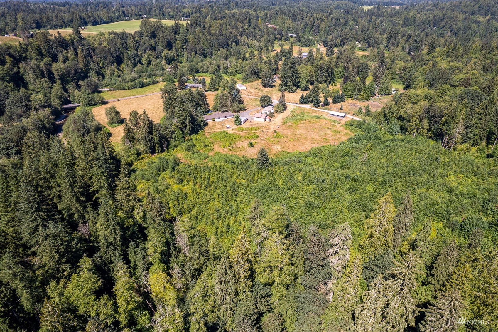 7-tract Whites Road Arlington, WA 98223 - Photo 2 of 15 a view of a houses with a yard