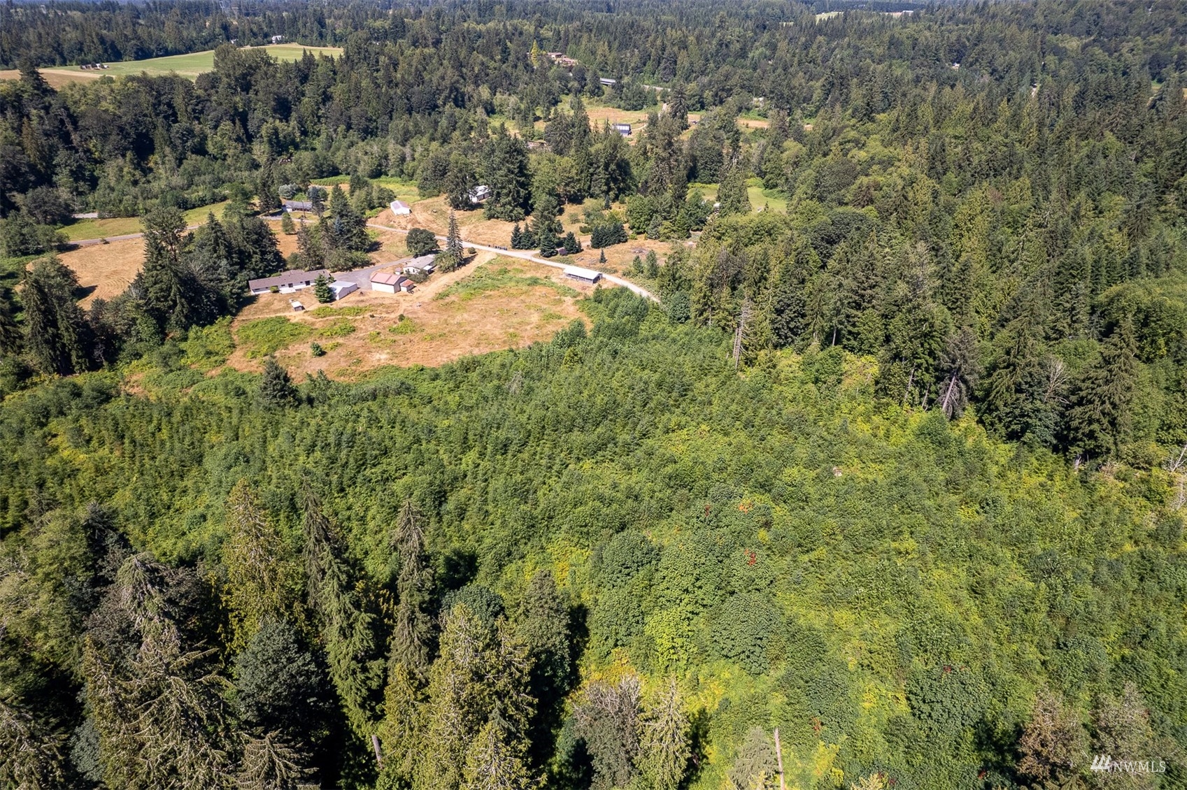 7-tract Whites Road Arlington, WA 98223 - Photo 3 of 15 a view of a forest with a houses
