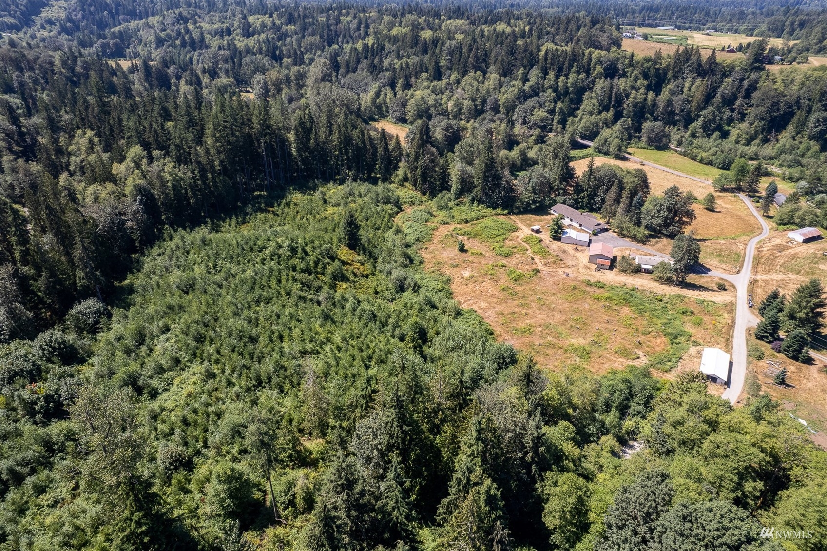 7-tract Whites Road Arlington, WA 98223 - Photo 5 of 15 a view of a yard with plants