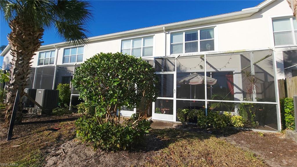 16117 Ravina Way, Unit 33 Naples, FL 34110 - Photo 18 of 25 Cozy patio to the lake