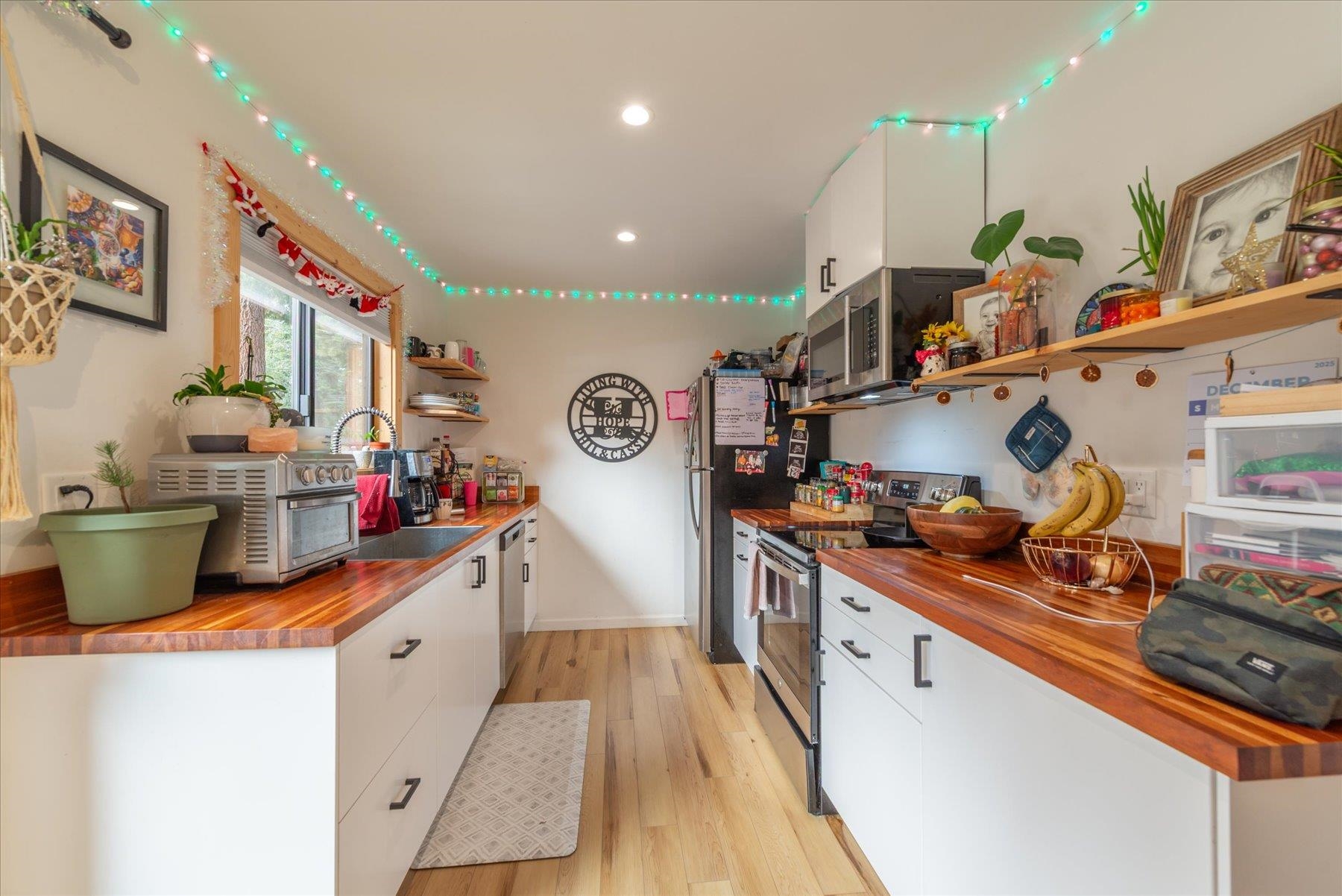 6917 Toyon Road Tahoe Vista, CA 96148 - Photo 2 of 25 a kitchen with kitchen island granite countertop lots of counter top space