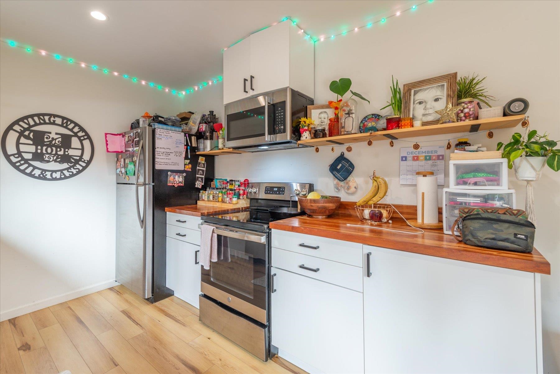 6917 Toyon Road Tahoe Vista, CA 96148 - Photo 4 of 25 a kitchen with stainless steel appliances granite countertop a sink and cabinets