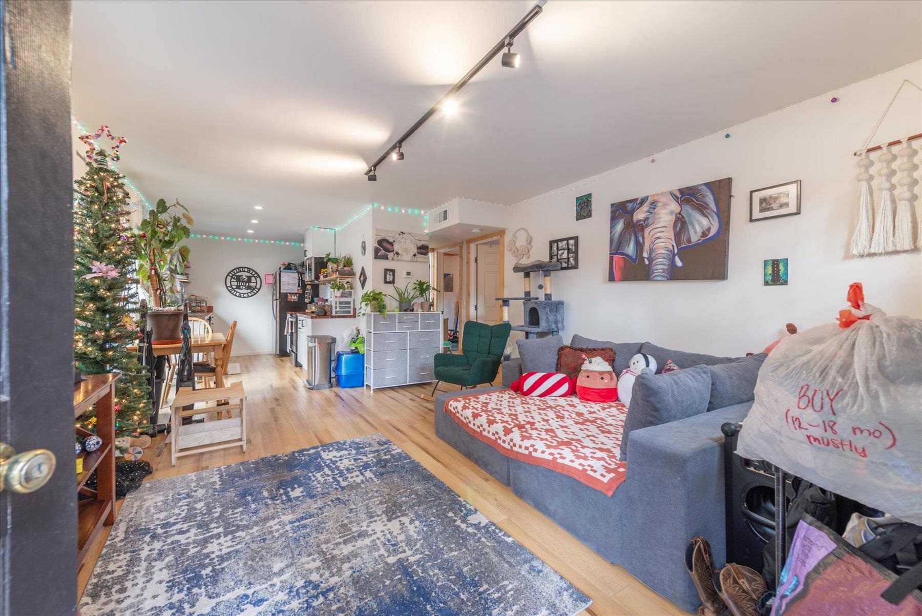 6917 Toyon Road Tahoe Vista, CA 96148 - Photo 5 of 25 a bed room with a bed and a couch