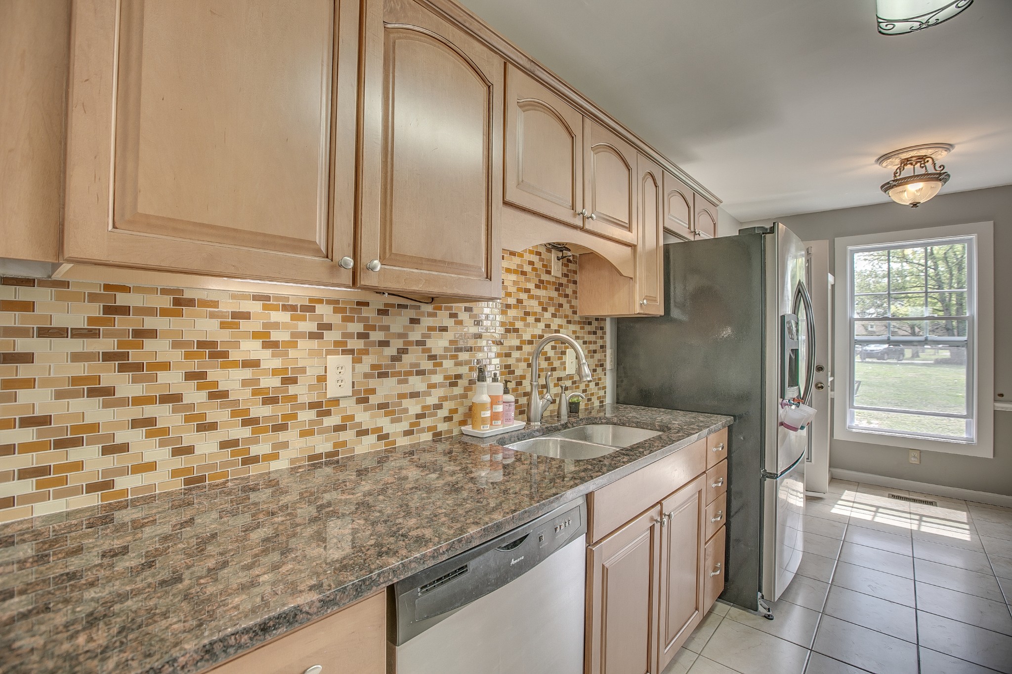 7953 Franklin Road Murfreesboro, TN 37128 - Photo 6 of 26 a bathroom with a granite countertop sink and a mirror