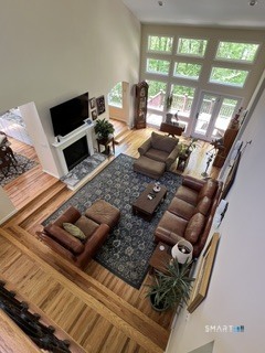72 Pinnacle Road Ellington, CT 06029 - Photo 16 of 38 a living room with furniture and a flat screen tv