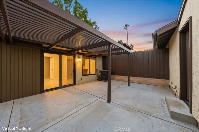 a view of backyard with a garage