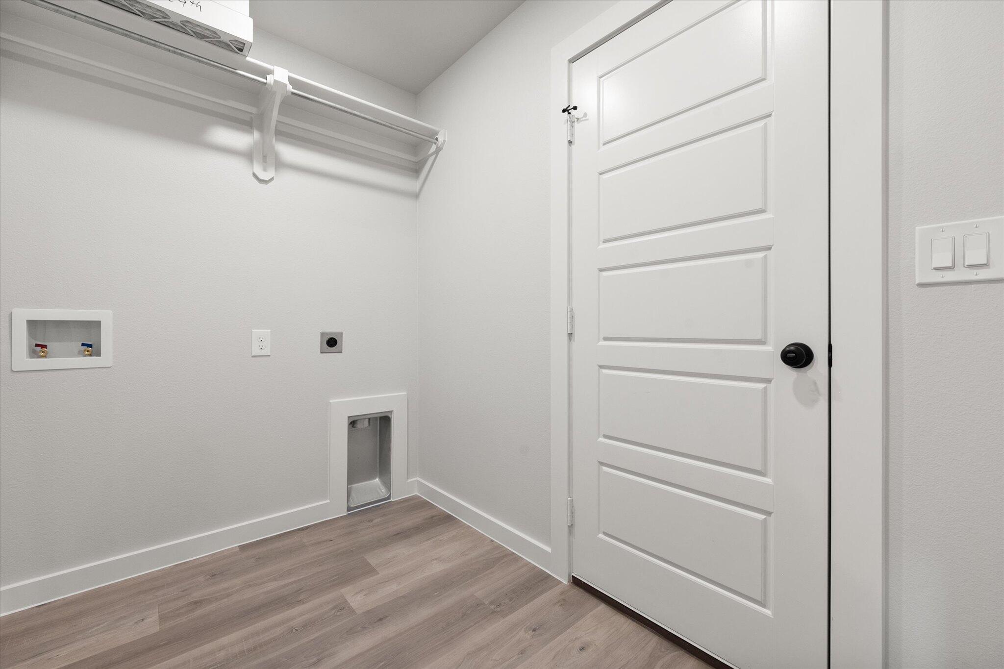 8605 29th Street Lubbock, TX 79407 - Photo 19 of 21 a view of an empty walk in closet