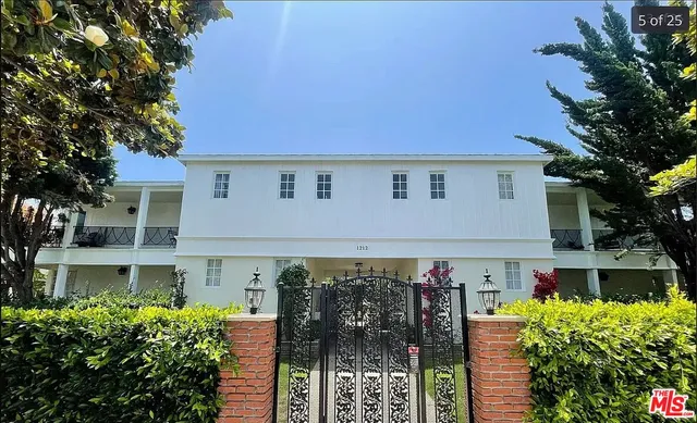 a view of a building with a garden