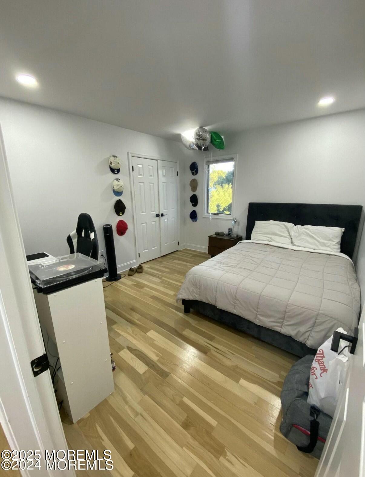 604 Van Note Parkway Oakhurst, NJ 07755 - Photo 15 of 19 a bedroom with a bed and a window