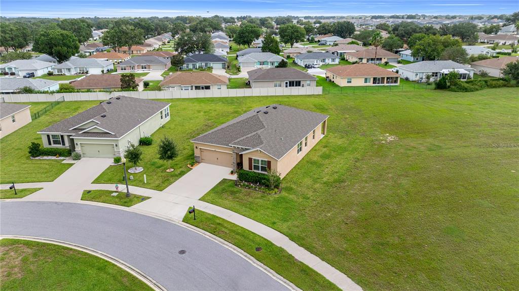 6125 Southwest 88th Loop Ocala, FL 34476 - Photo 5 of 29 an aerial view of a house with a garden