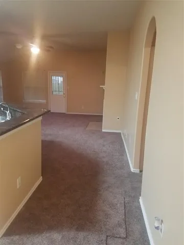 a view of a room with a fireplace