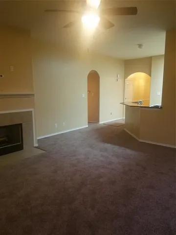 a living room with a fireplace