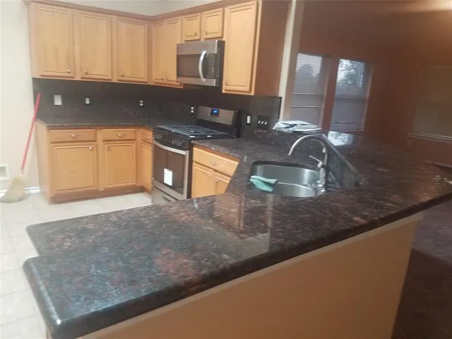 a view of a livingroom with a fireplace