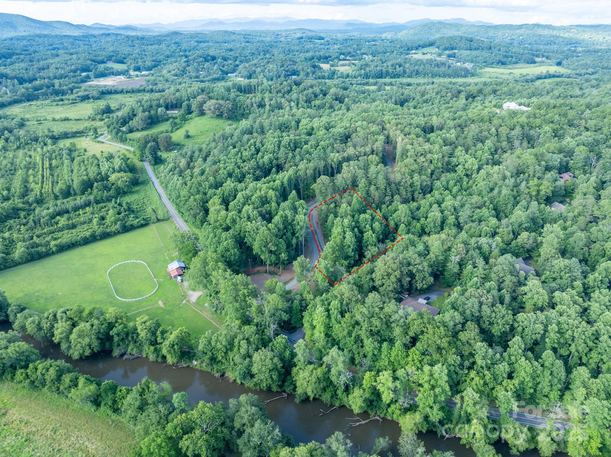 102 Reserve Way, Unit 2 Hendersonville, NC 28739 - Photo 3 of 22 an aerial view of residential house with outdoor space and trees all around