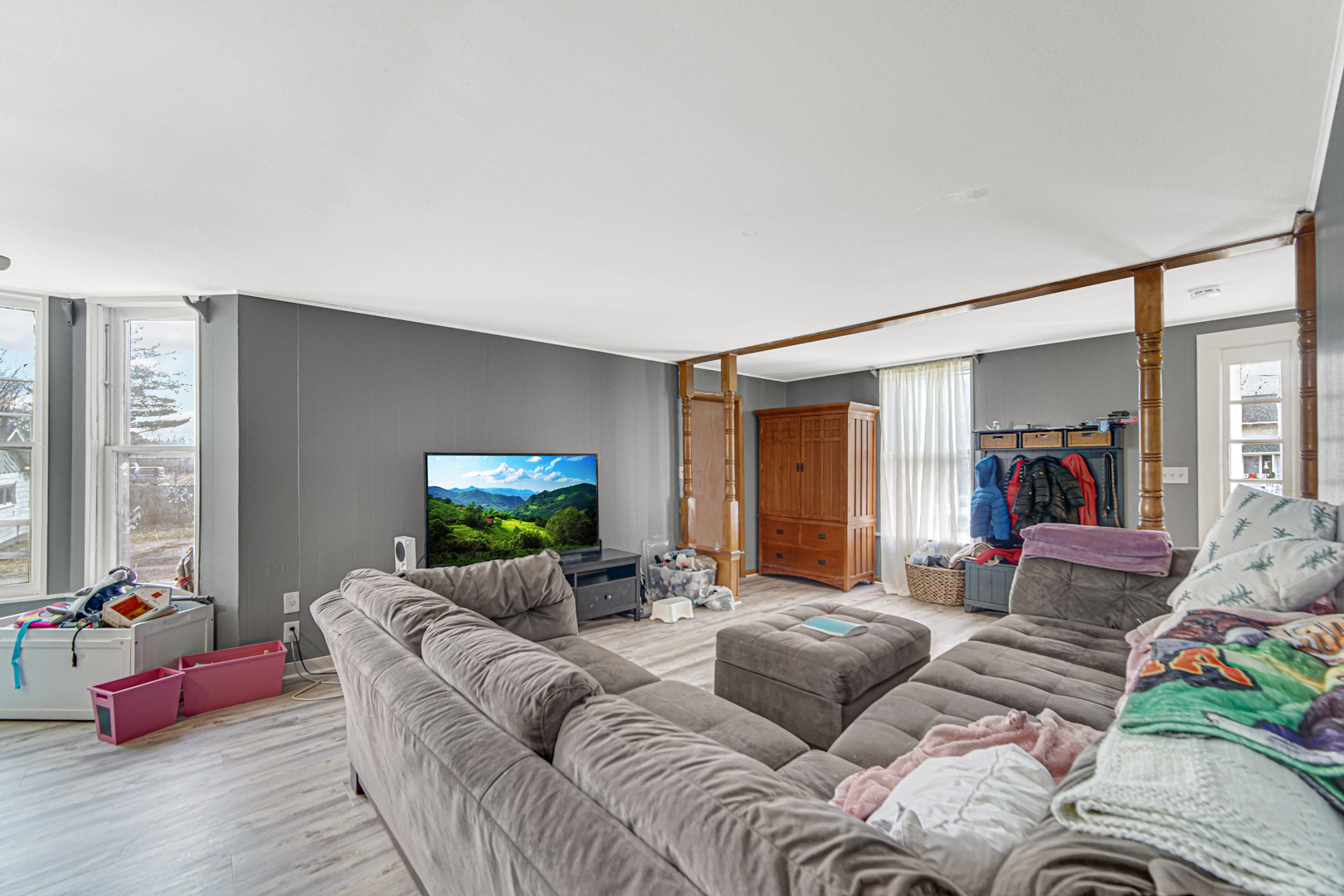 15409 Joliet Road Plainfield, IL 60544 - Photo 2 of 32 a living room with furniture and a flat screen tv