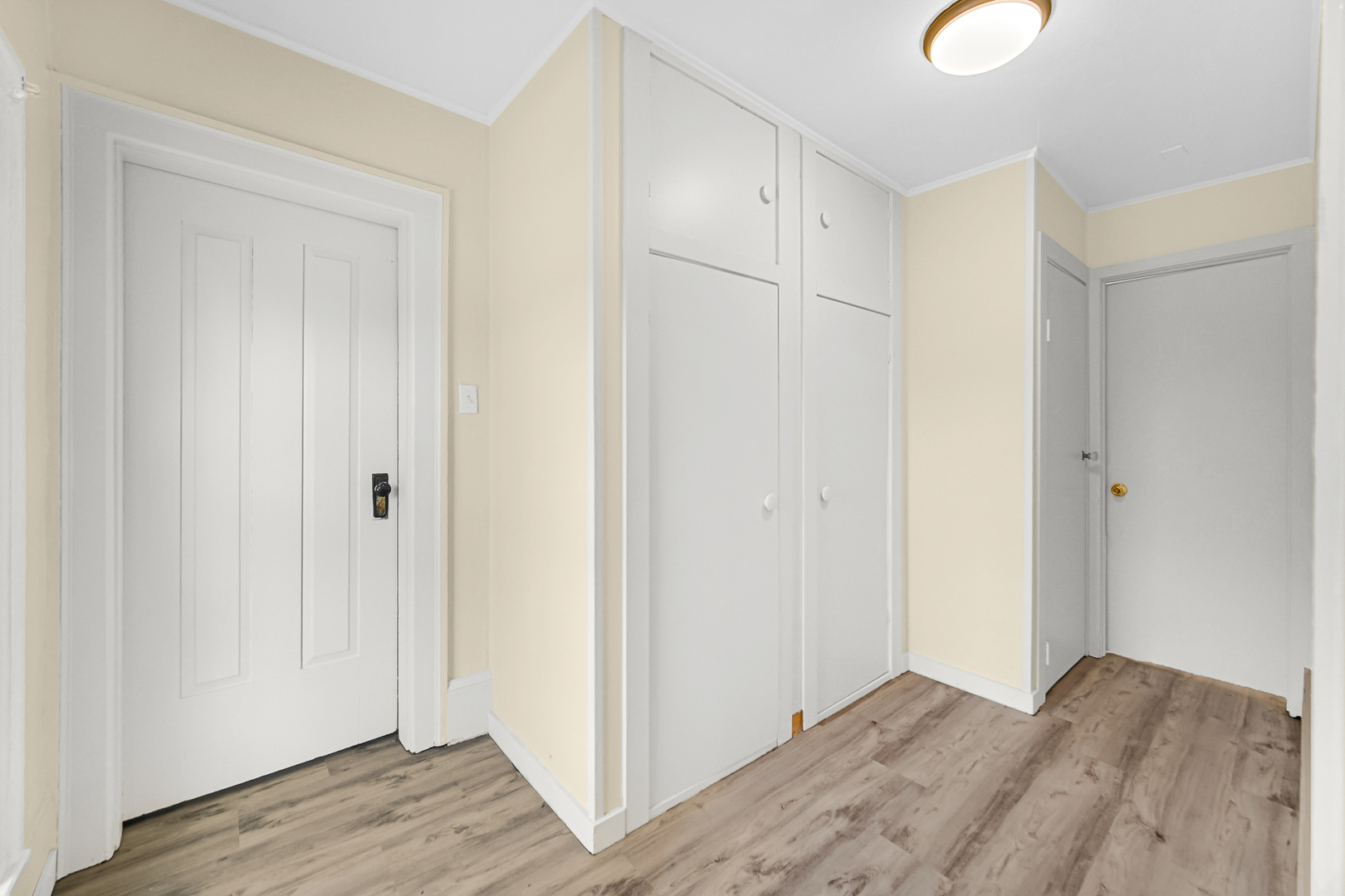 15409 Joliet Road Plainfield, IL 60544 - Photo 23 of 32 a view of an empty room with wooden floor