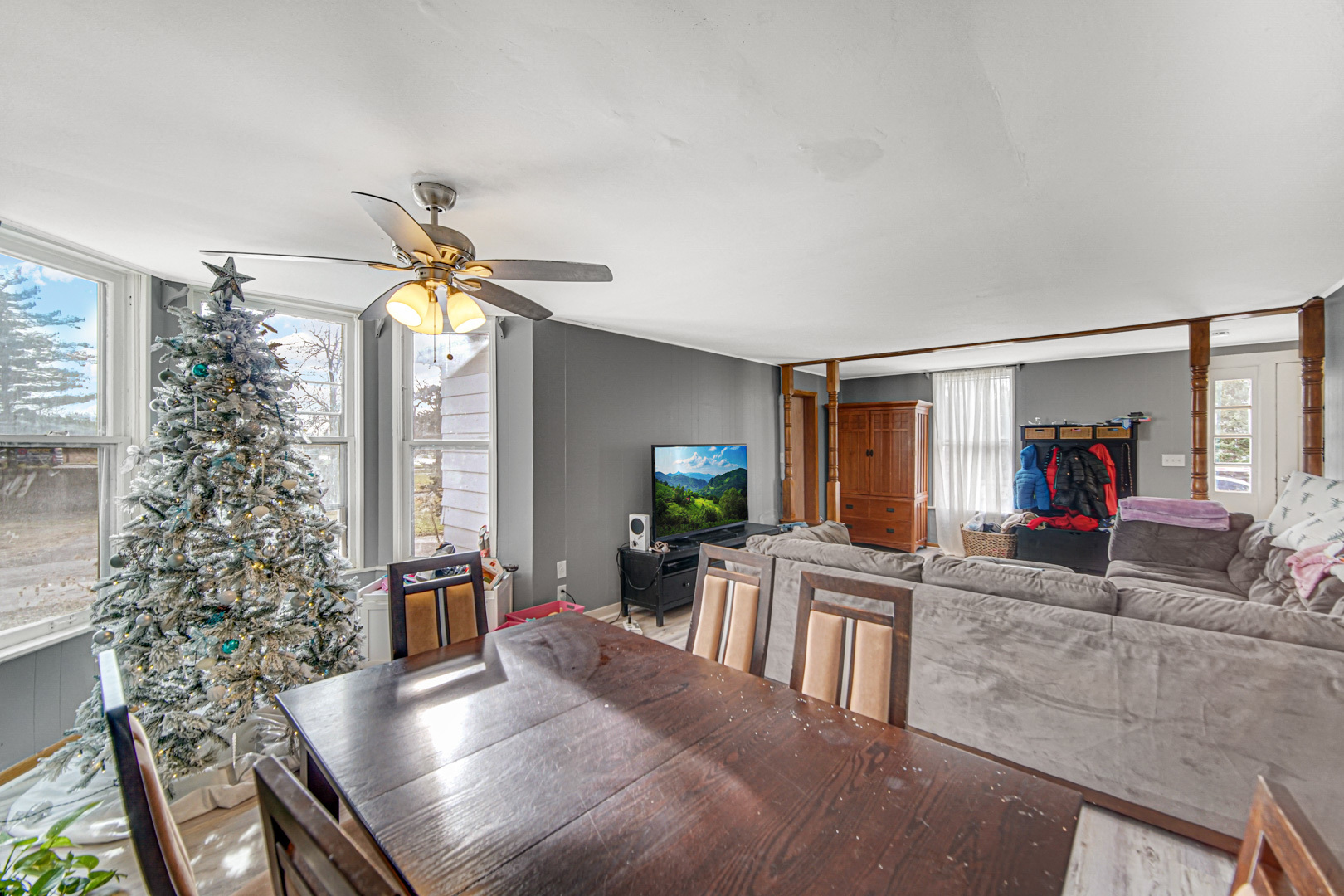 15409 Joliet Road Plainfield, IL 60544 - Photo 3 of 32 a view of a livingroom with furniture window and wooden floor