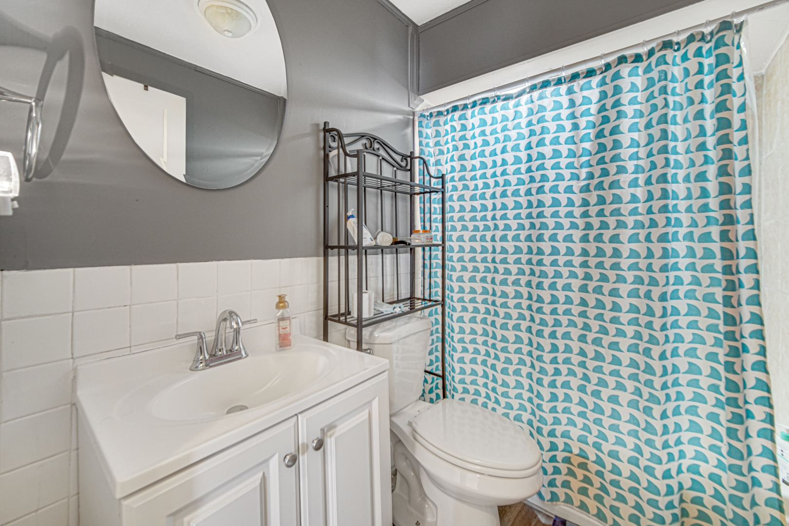 15409 Joliet Road Plainfield, IL 60544 - Photo 5 of 32 a bathroom with a sink a toilet and a mirror
