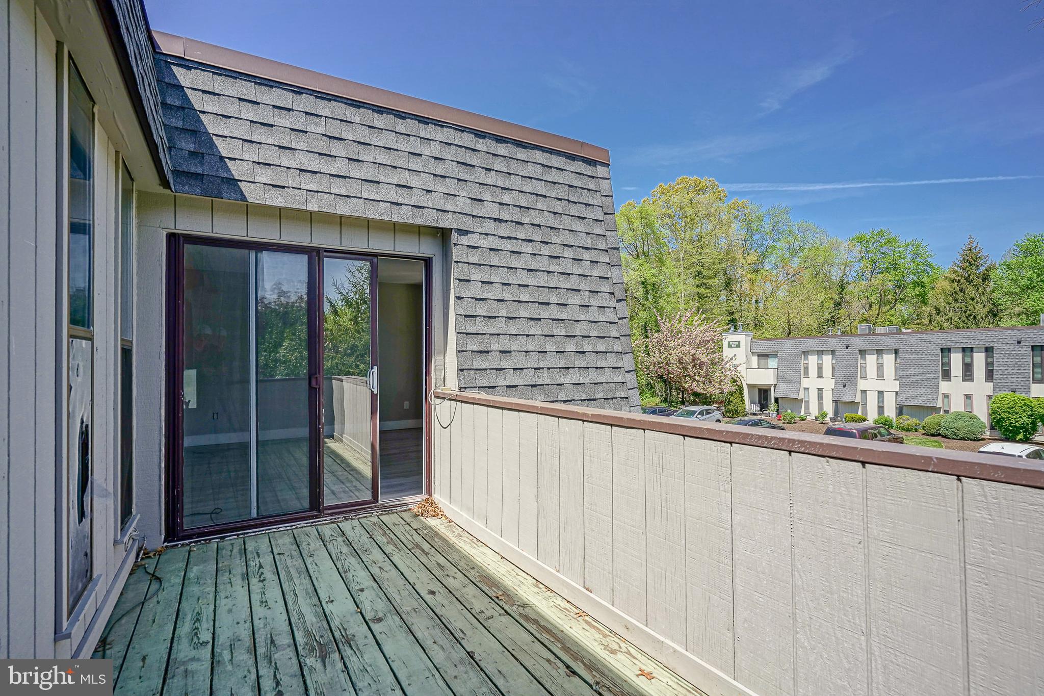 25 South Church Road, Unit 138 Maple Shade, NJ 08052 - Photo 23 of 23 a view of a balcony with wooden floor and fence