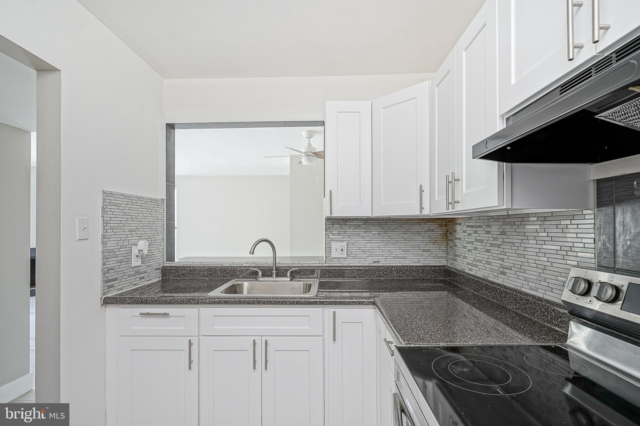 25 South Church Road, Unit 138 Maple Shade, NJ 08052 - Photo 8 of 23 a kitchen with a sink and cabinets