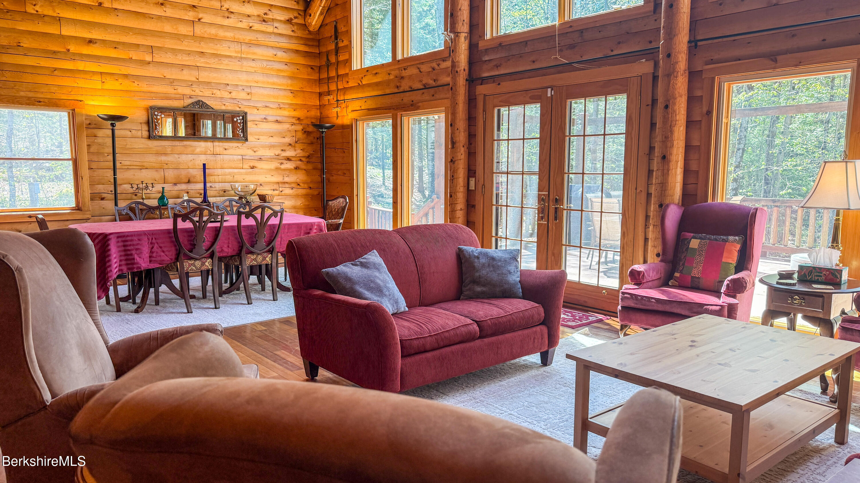 233 Algerie Road Becket, MA 01223 - Photo 12 of 48 a living room with furniture and a large window
