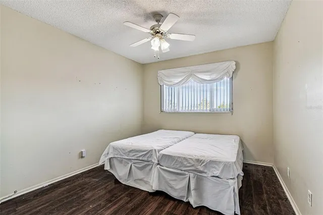an aerial view of a city with lawn chairs