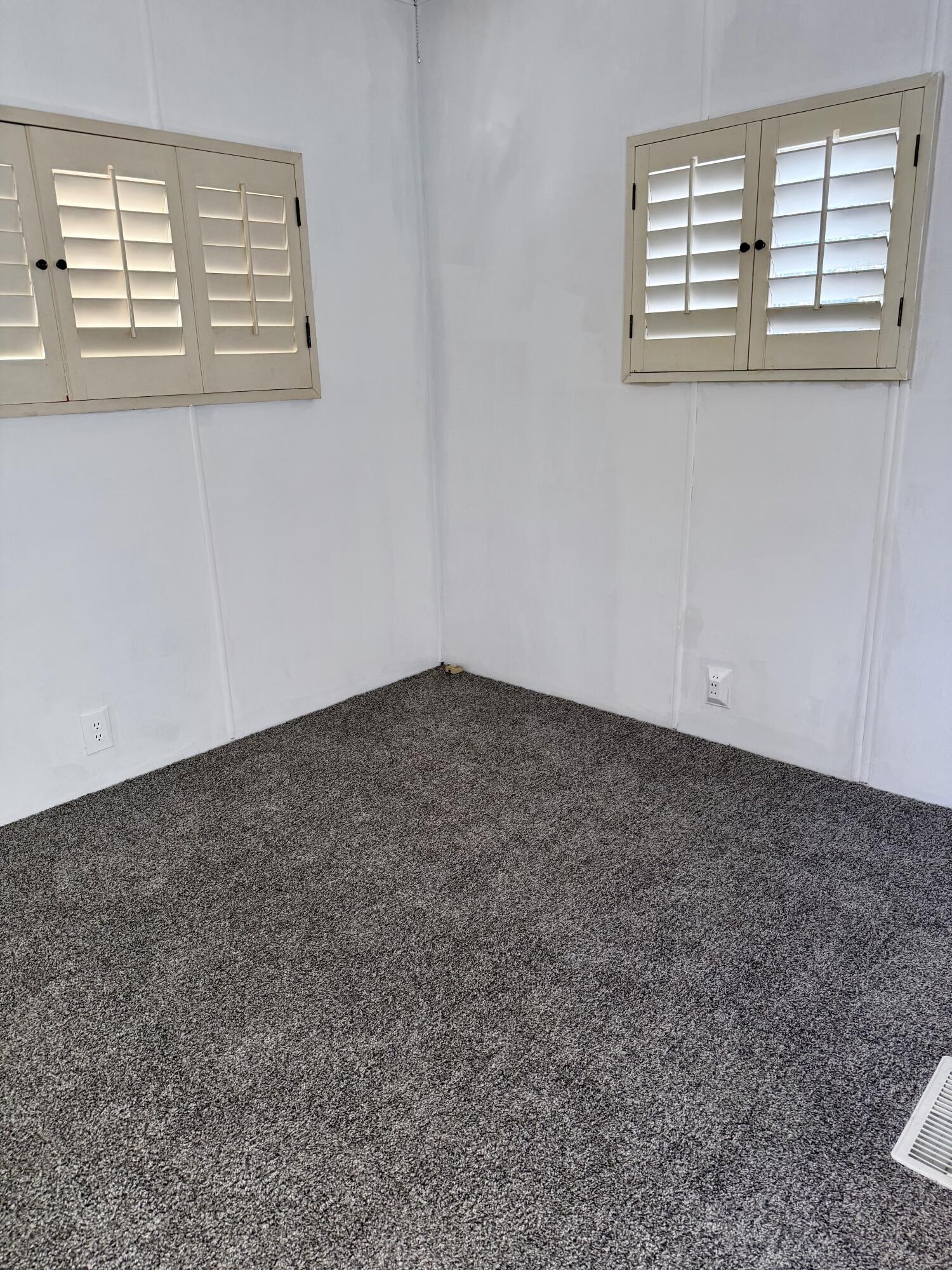 22 Jupiter Street Palm Springs, CA 92264 - Photo 19 of 35 an empty room with windows