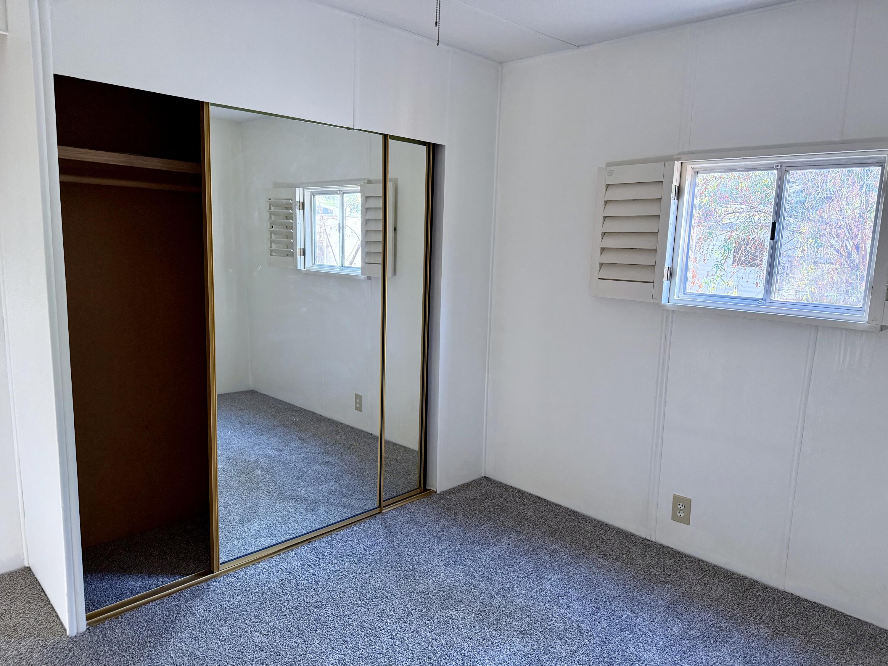 22 Jupiter Street Palm Springs, CA 92264 - Photo 20 of 35 an empty room with windows
