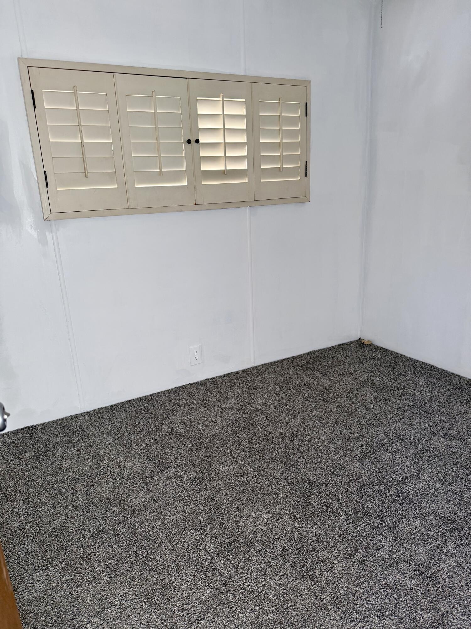 22 Jupiter Street Palm Springs, CA 92264 - Photo 24 of 35 an empty room with windows